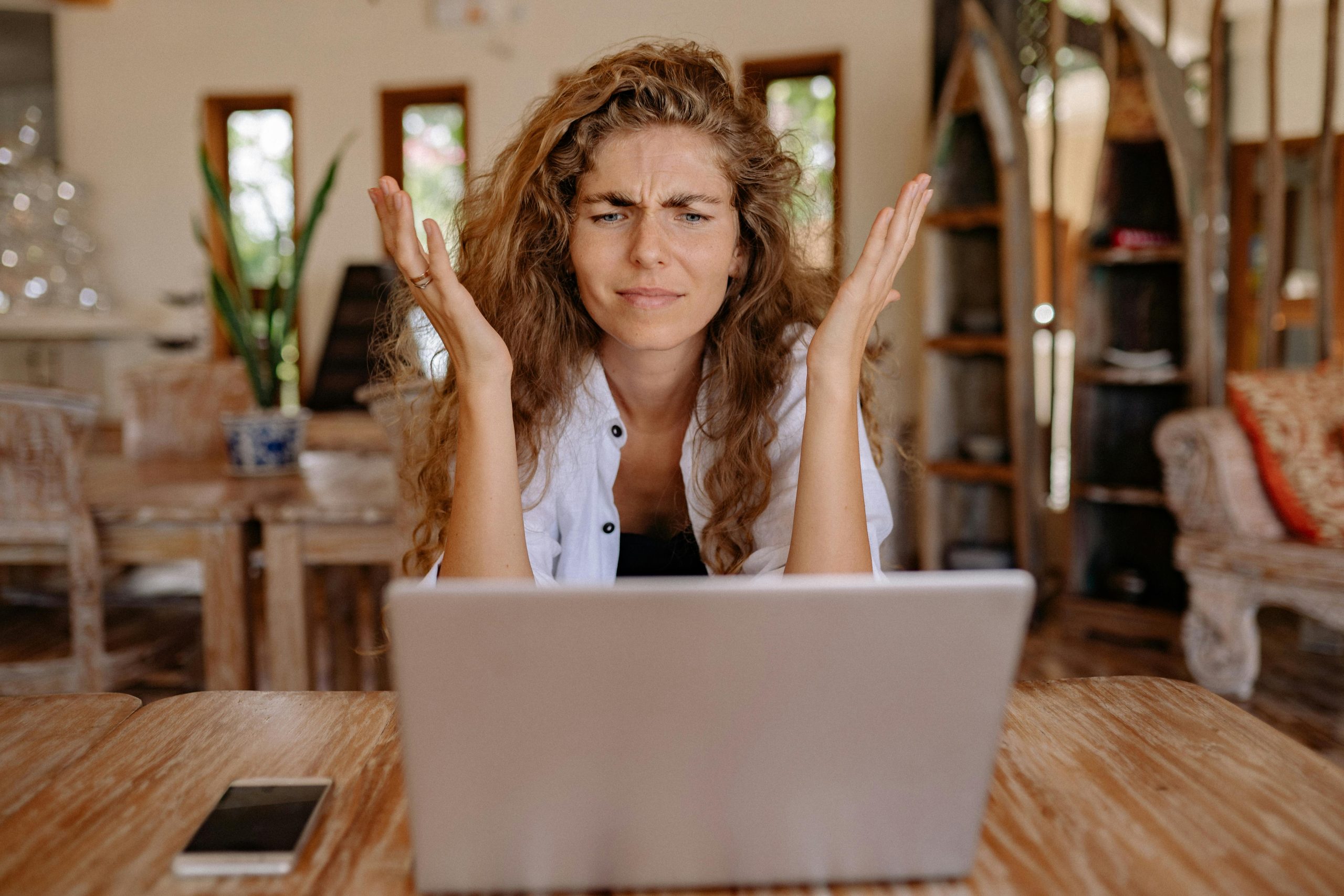 Photo of woman showing frustrations on her face